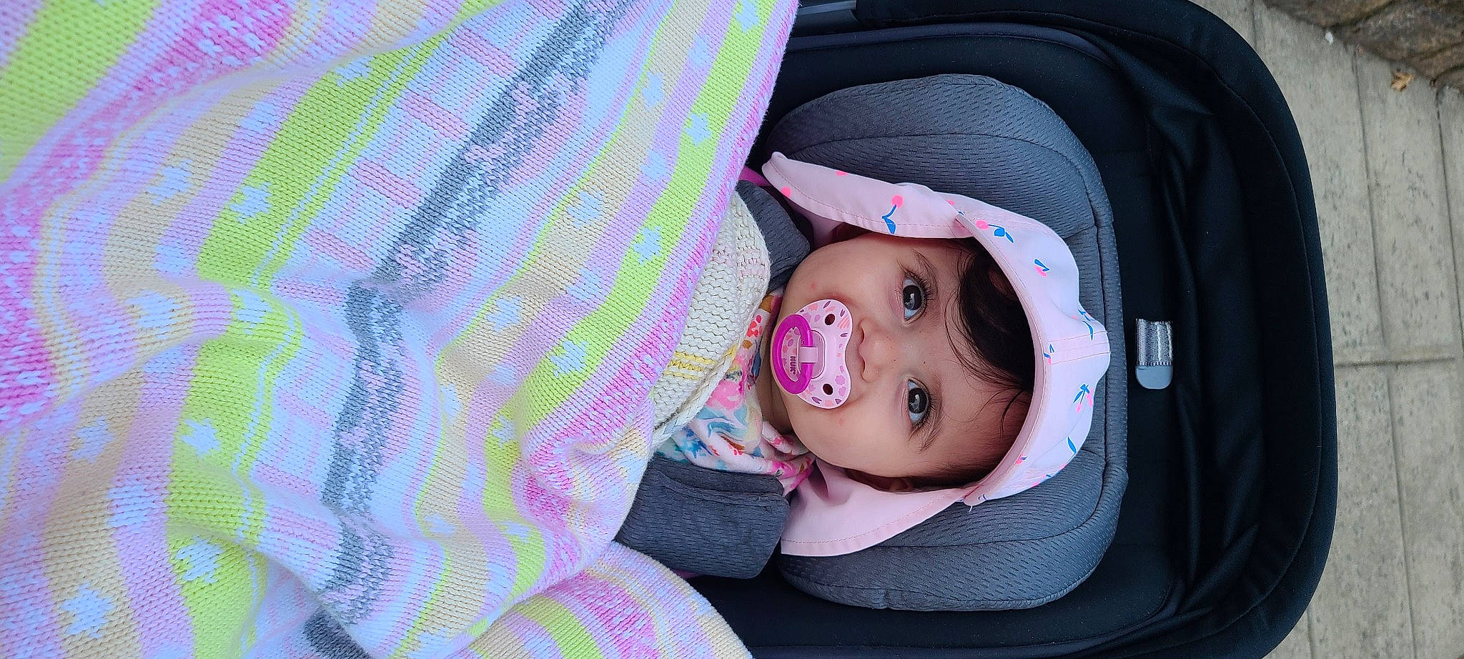 Aisha is registered to the contest to win money with this photo: baby, baby_carriage, baby_products, baby_safety, baby_toddler_clothing, car_seat, cheek, child, comfort, headwear, linens, magenta, outerwear, pattern, person, pink, plaid, purple, sitting, sleeve