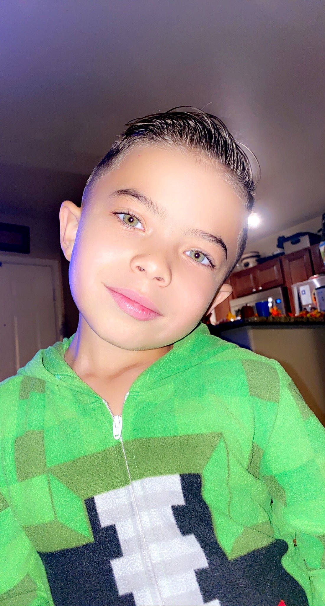 Jj is registered to the contest to win money with this photo: black_hair, bookcase, buzz_cut, caesar_cut, cheek, clothing, cool, crew_cut, ear, eyebrow, eyelash, forehead, hairstyle, iris, jaw, joy, lip, person, shelf, shelving