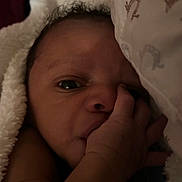 Duraey is registered to the contest to win money with this photo: baby, infant, blanket, hand, face, skin, closeup, portrait, sleeping, cozy, soft, newborn, cute, child, indoors, resting, comfort, wrapped, expression, young
