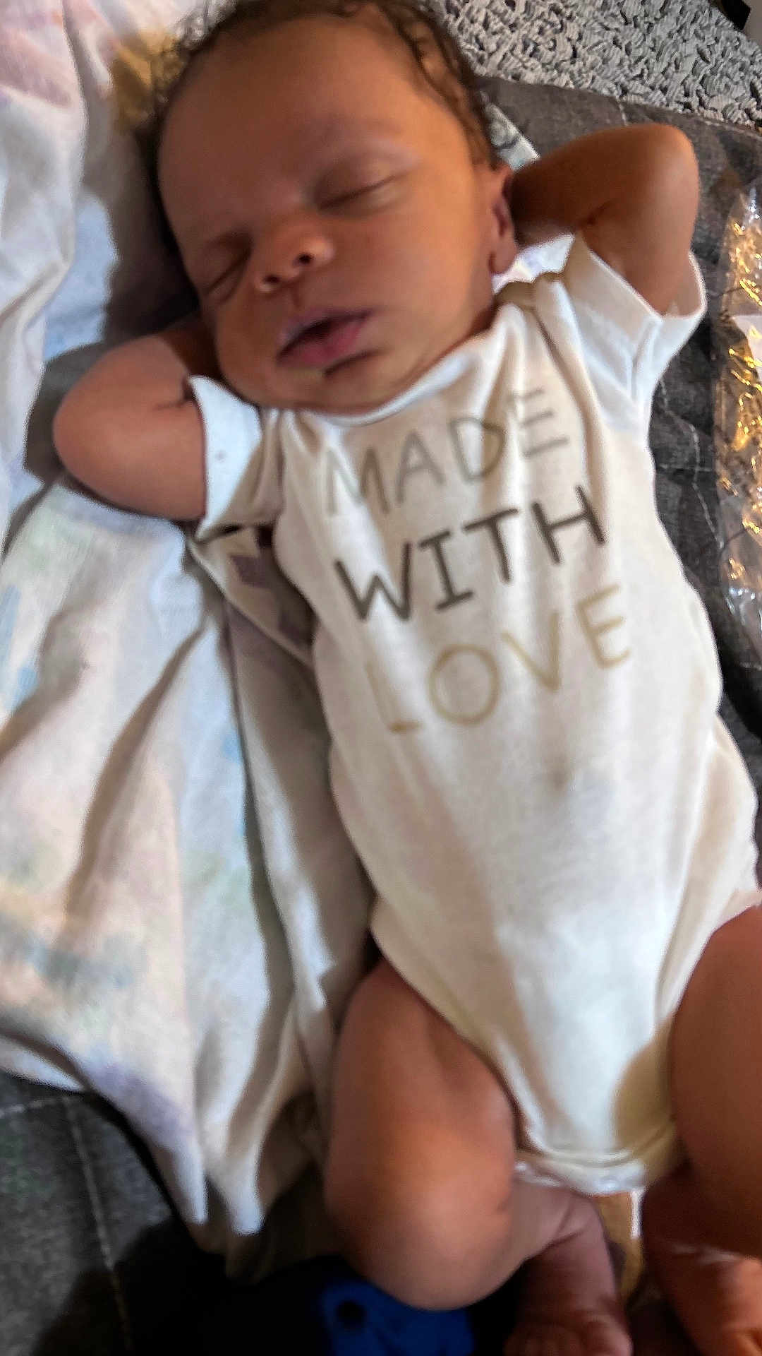 Duraey is registered to the contest to win money with this photo: baby, sleeping, onesie, infant, blanket, clothing, face, person, skin, hands, legs, cute, rest, comfort, toddler, newborn, portrait, indoors, soft, peaceful