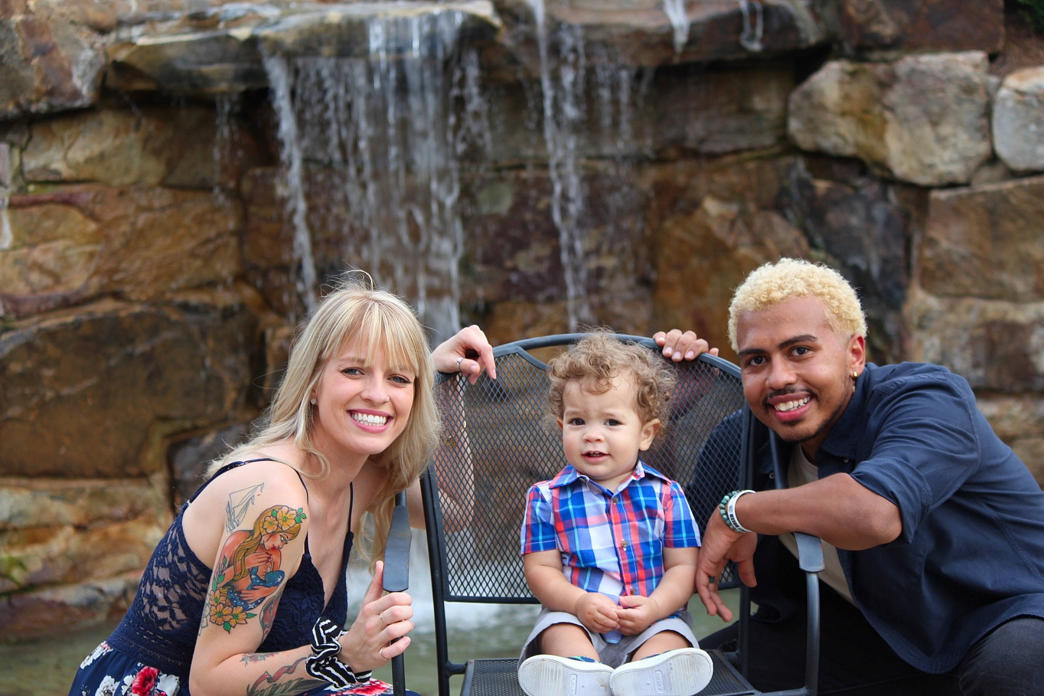 Zayne is registered to the contest to win money with this photo: child, event, family, fun, joy, leisure, people, person, photography, recreation, rock, smile, toddler, tourism, tree, vacation, water_feature