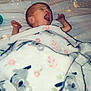 Aurelia is registered to the contest to win money with this photo: baby, blanket, yawning, sleeping, infant, bed, soft, floral_pattern, cozy, cute, face, hands, lying_down, comfort, nap_time, sparkles, night, cute_baby, portrait, child