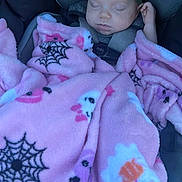 Aurelia is registered to the contest to win money with this photo: baby, blanket, car_seat, child, clothing, cozy, cute, cute_baby, fabric, ghost, headband, infant, outdoor, pink, resting, safety, sleeping, spider_web, toddler, wrapped