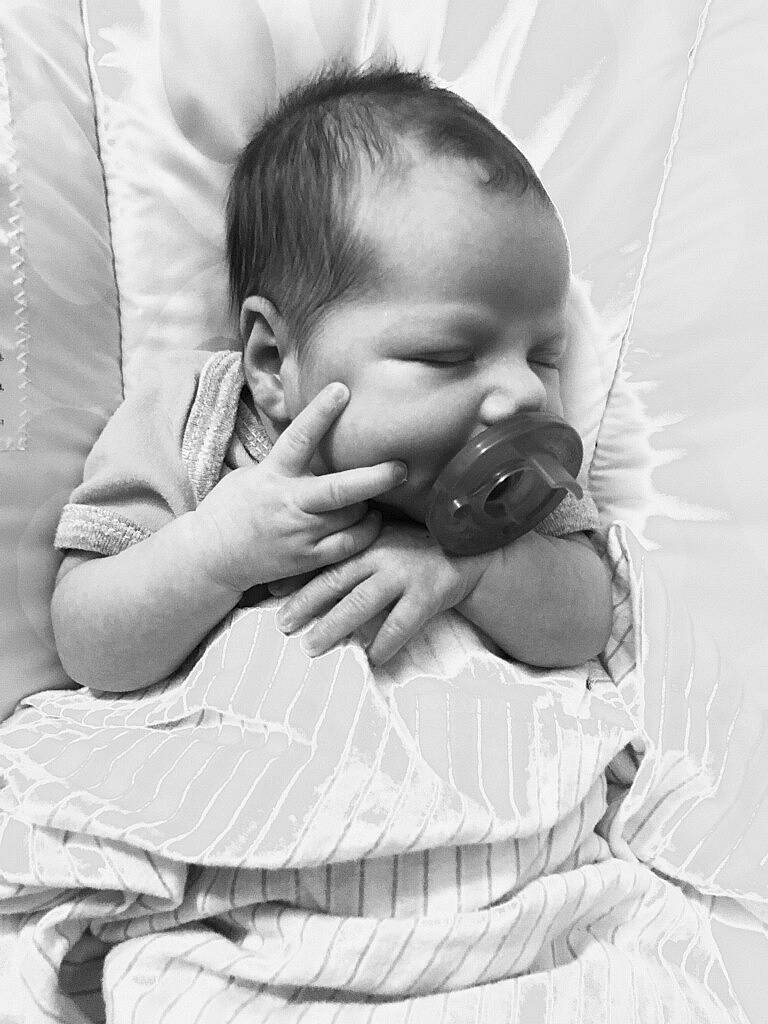 Marie is registered to the contest to win money with this photo: baby, birth, black_and_white, cheek, child, face, facial_expression, forehead, hand, head, monochrome, mouth, nose, person, photograph, photography, product, skin, sleep, toddler