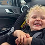 Cohen joined the competition — help win amazing prizes! child, toddler, car_seat, curly_hair, smiling, happy, car_interior, seatbelt, window, door_handle, clothing, hand, legs, safety, baby, portrait, vehicle, seat, person, cute