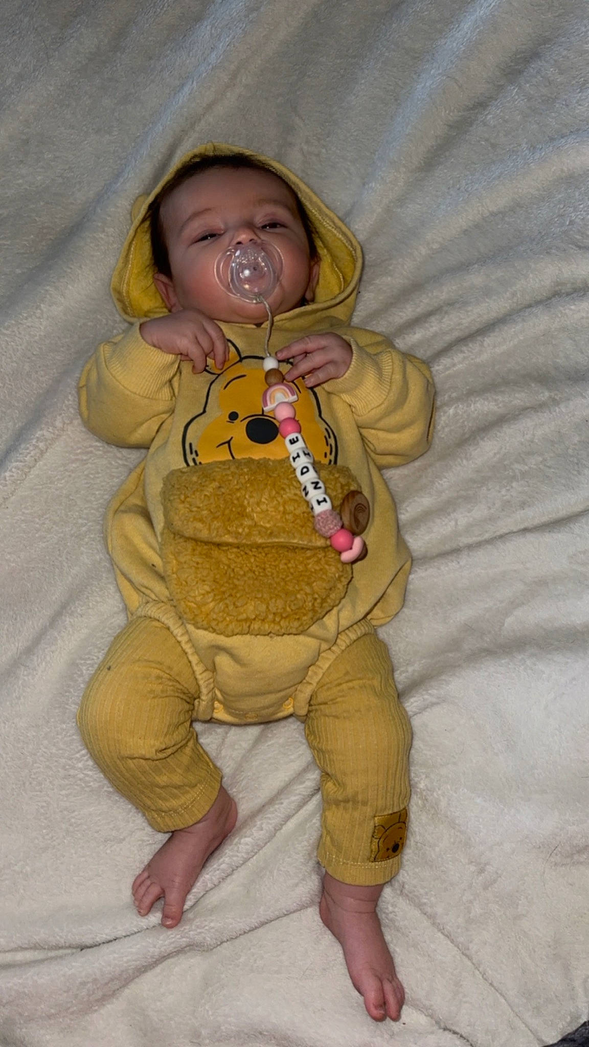 Indie Rose is registered to the contest to win money with this photo: baby, baby_products, baby_safety, baby_sleeping, baby_toddler_clothing, baby_toys, cheek, comfort, eye, face, finger, fur, gesture, hand, infant_bed, linens, person, sleeve, stuffed_toy, thumb