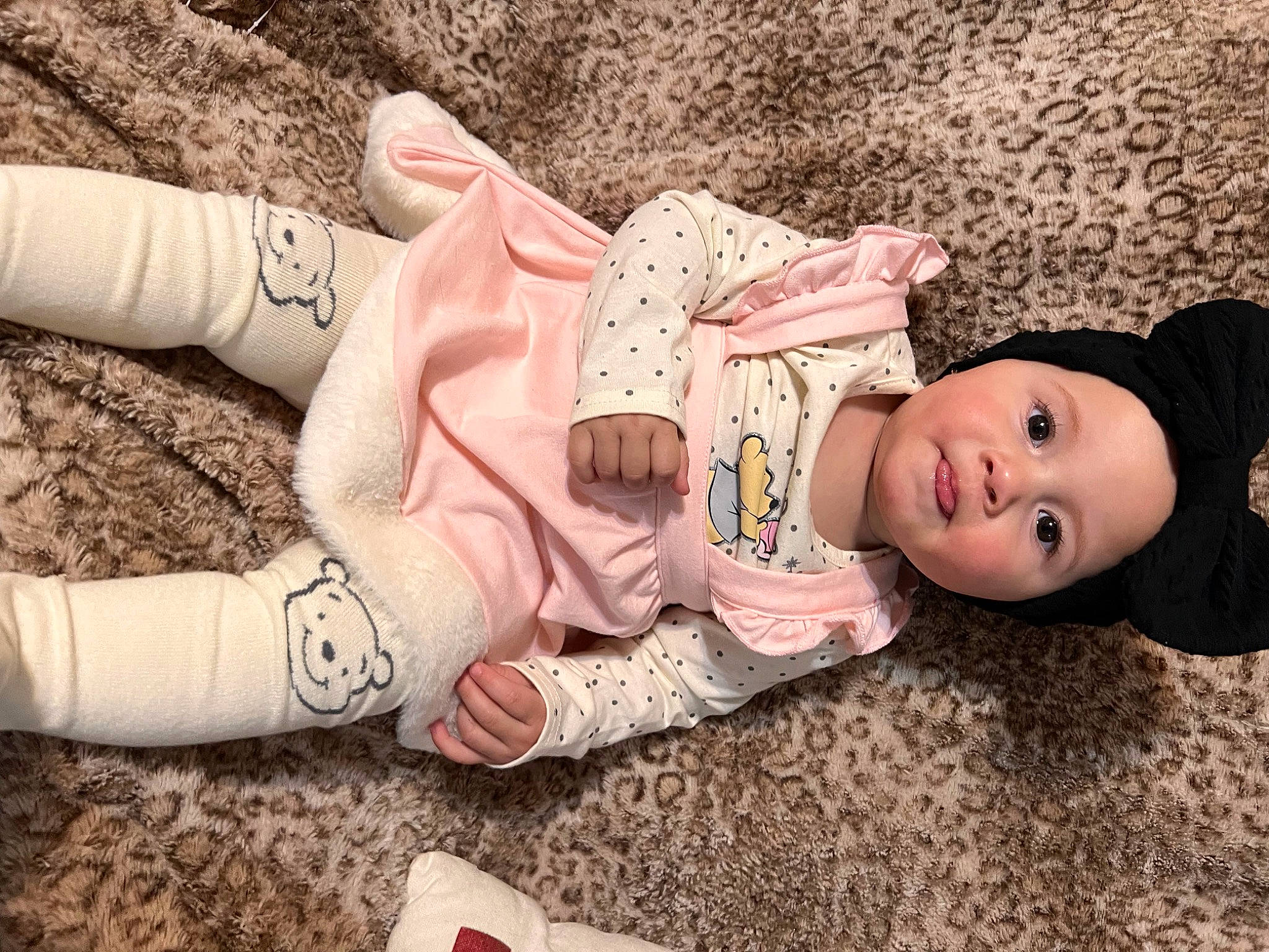 Khalani joined the competition — help win amazing prizes! baby, baby_toddler_clothing, cheek, child, comfort, finger, grass, hand, hat, headwear, human_body, human_leg, joint, pattern, person, sitting, skin, sleeve, thigh, toddler