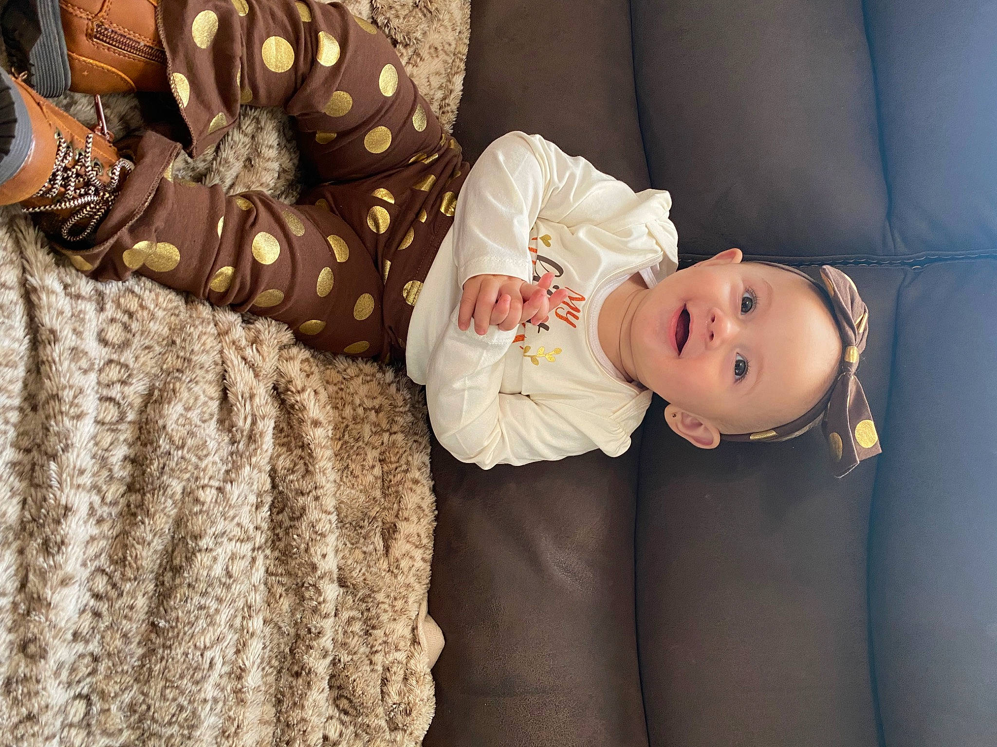 Khalani joined the competition — help win amazing prizes! baby, baby_toddler_clothing, child, comfort, couch, dress, fashion_design, glasses, happy, hat, headgear, human_body, human_leg, person, plant, skin, sleeve, smile, thigh, toddler