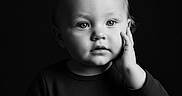 Sarah joined the competition — help win amazing prizes! toddler, child, black_and_white, portrait, bow, face, hand, expression, studio_lighting, soft_light, young_child, cute, innocence, monochrome, clothing, pose, eyes, headwear, minimalist, thoughtful