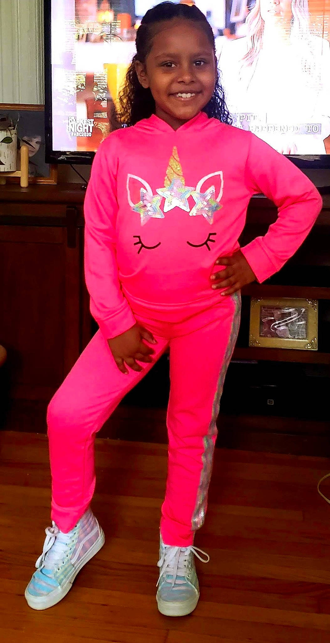 Annaliz is registered to the contest to win money with this photo: carmine, costume, event, fashion_design, flooring, fun, happy, joy, magenta, person, picture_frame, pink, purple, shoe, sleeve, smile, sportswear, t_shirt, television, thigh