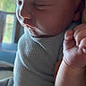 Isaiah is registered to the contest to win money with this photo: newborn, baby, infant, child, sleeping, face, portrait, close_up, soft_lighting, window, indoor, blanket, clothing, hand, fist, peaceful, cozy, natural_light, sitting, photography