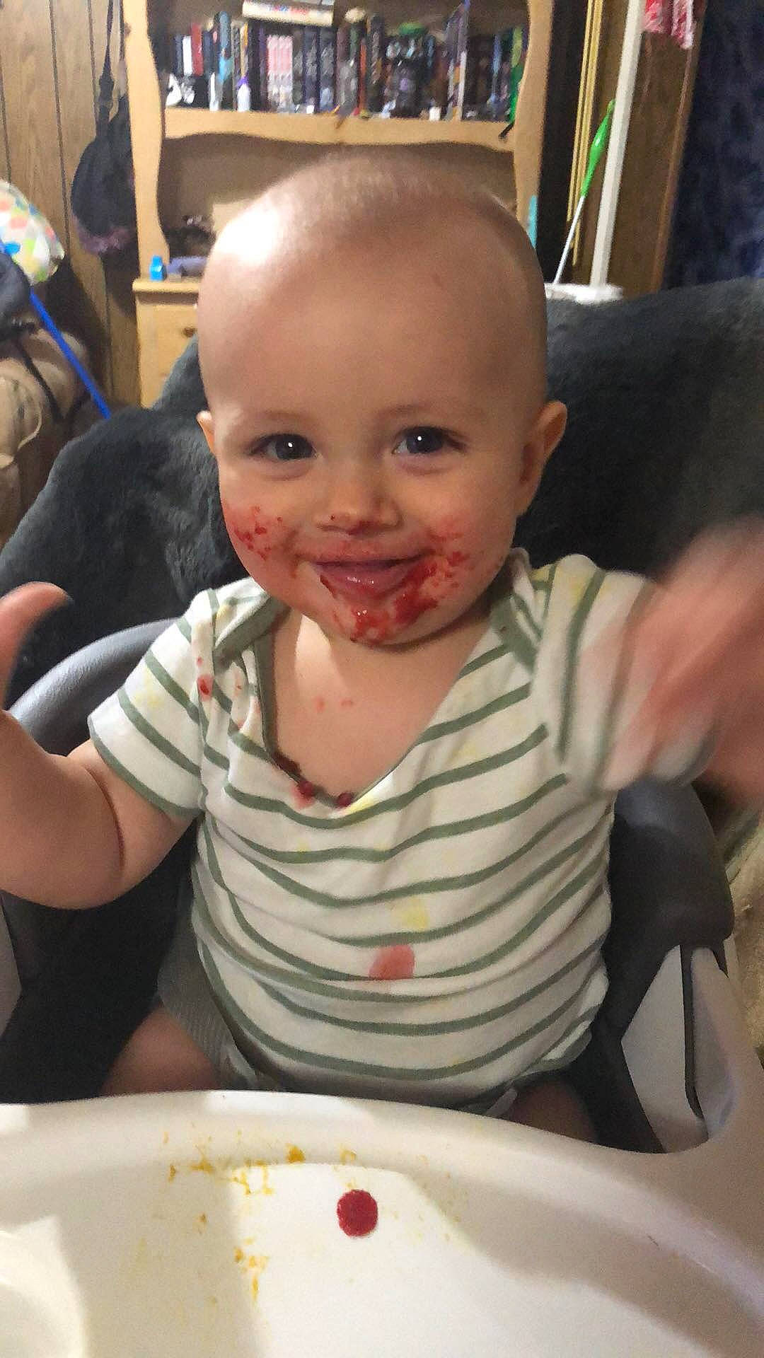 Lucius is registered to the contest to win money with this photo: baby, cheek, child, comfort_food, ear, eating, face, food, forehead, head, meal, nose, person, skin, smile, toddler