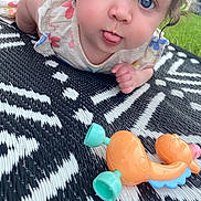Willa joined the competition — help win amazing prizes! baby, blanket, bodypart, face, furniture, grass, hammock, head, lawn, nature, outdoors, park, person, photography, plant, portrait, quilt, summer, toy, yard