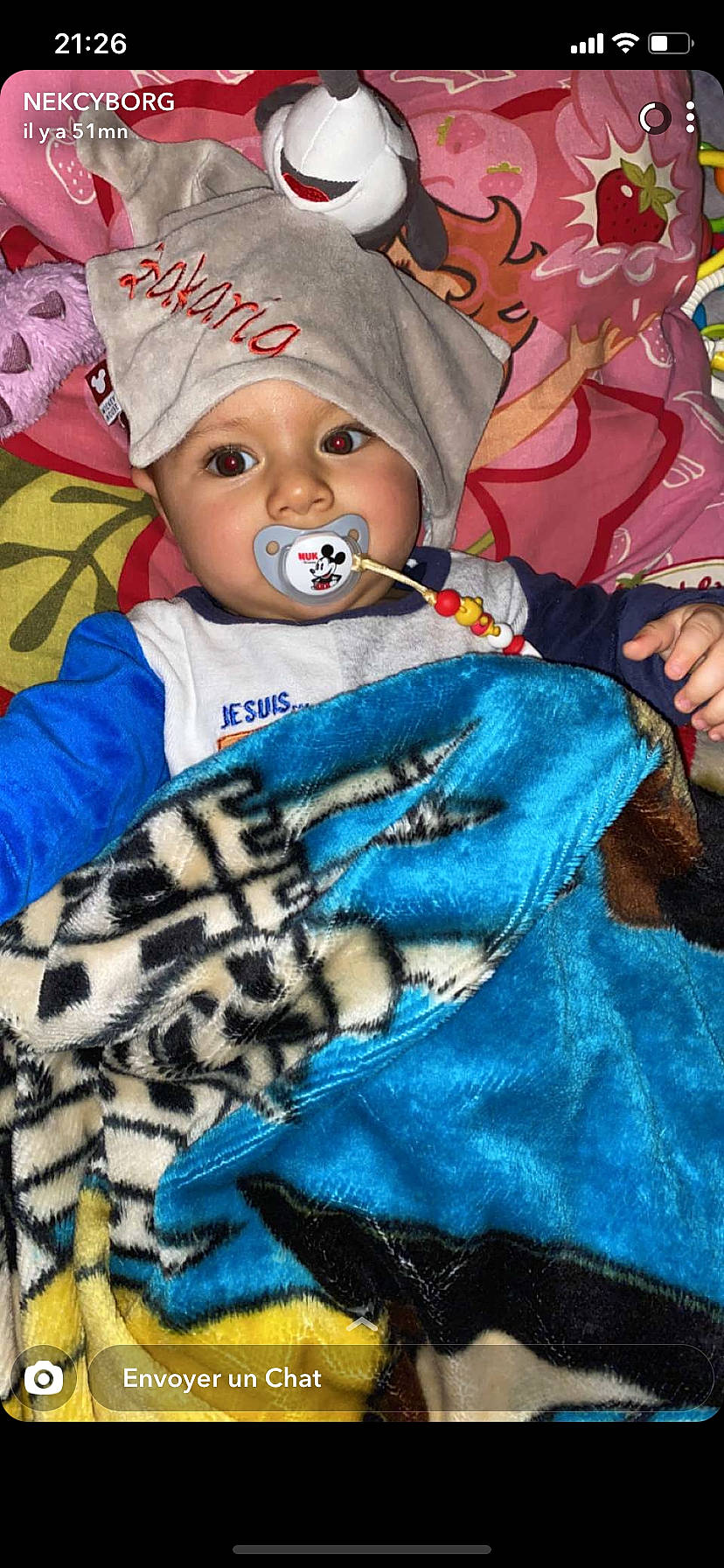 Zakaria a rejoint le concours — aidez-le/la à gagner de superbes lots ! baby, baby_products, baby_toddler_clothing, beanie, bonnet, child, costume_accessory, fur, headwear, hood, linens, person, toddler