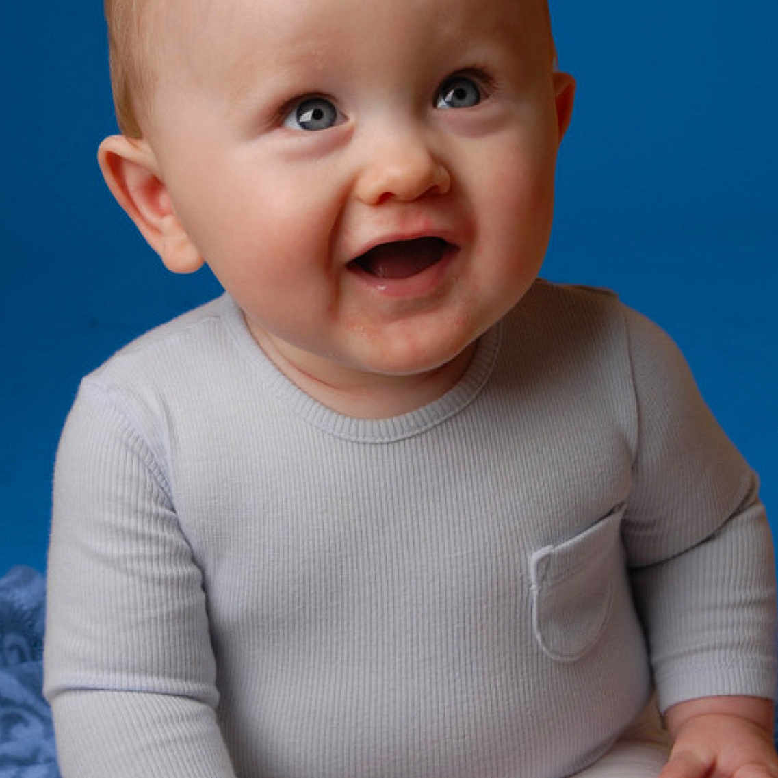 Arlo is registered to the contest to win money with this photo: baby, babylaughing, face, happy, head, laughing, person, photography, portrait, sitting, smile
