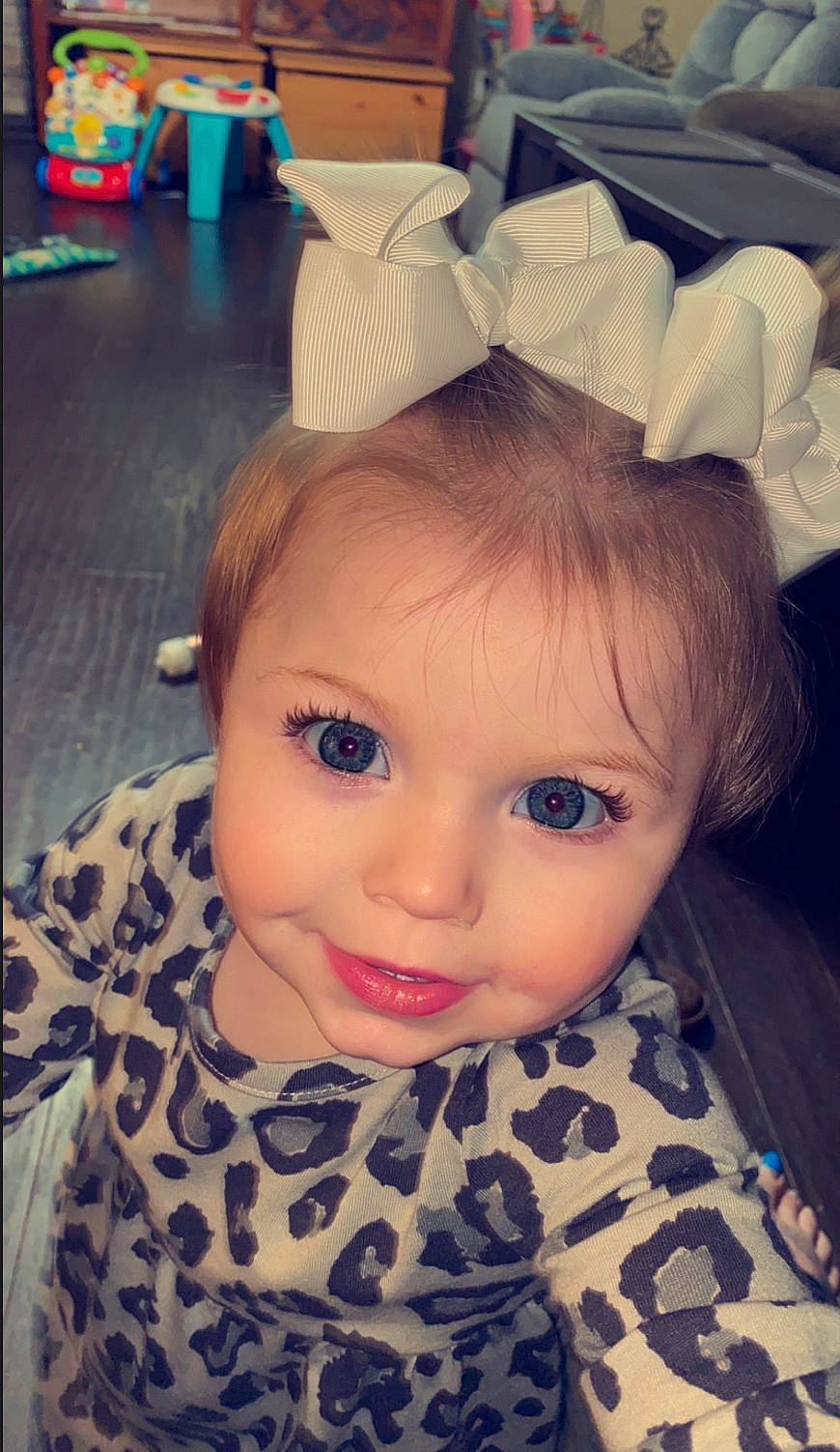 Harper is registered to the contest to win money with this photo: beauty, brown_hair, cheek, child, cool, costume_hat, doll, eye, eyebrow, eyelash, happy, head, human_body, iris, joy, lip, mouth, nose, person, pink