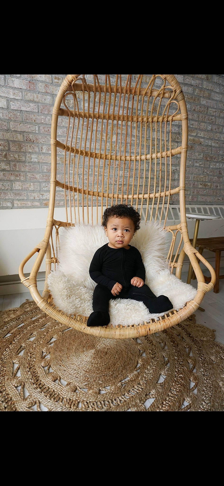 Kashton is registered to the contest to win money with this photo: baby, basket, beauty, chair, child, circle, comfort, flooring, furniture, grass, pattern, person, plant, product, sitting, textile, toddler, tree, wicker, wood