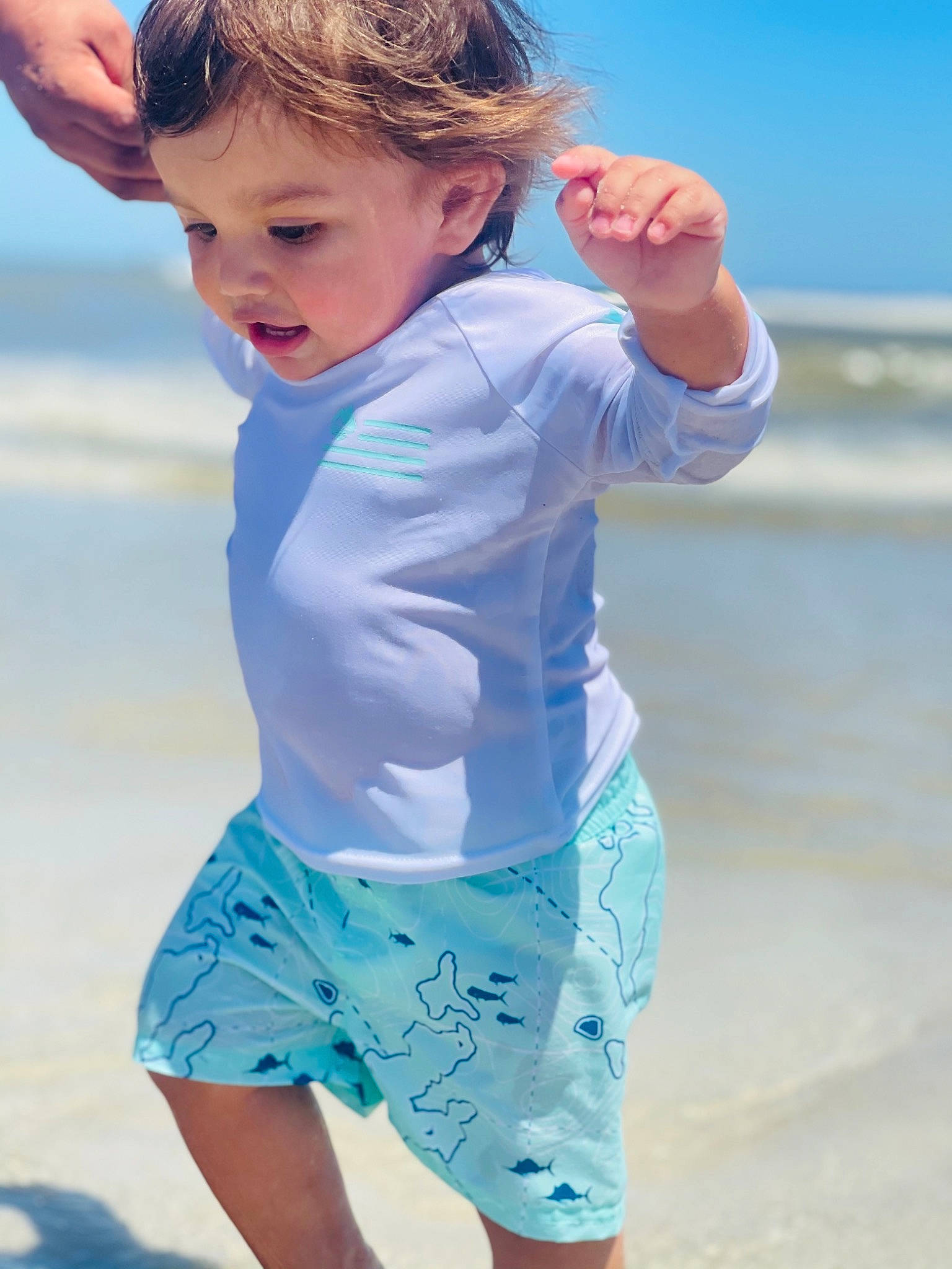 Marcello joined the competition — help win amazing prizes! azure, beach, blue, board_short, fun, gesture, hairstyle, happy, joint, leisure, light, people_in_nature, people_on_beach, person, photograph, sleeve, summer, toddler, trunks, waist