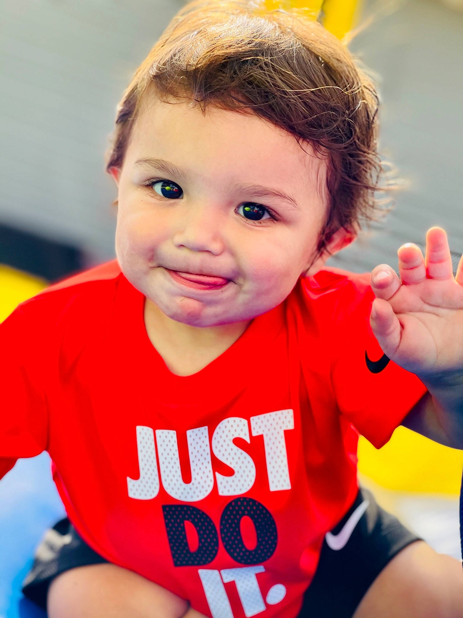 Marcello is registered to the contest to win money with this photo: arm, baby_toddler_clothing, cheek, chin, face, finger, gesture, hairstyle, happy, human_body, joy, leisure, mouth, neck, nose, person, shoulder, skin, sleeve, standing