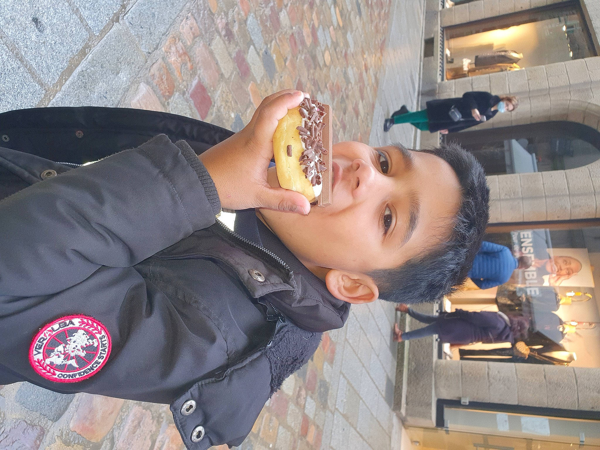 Brayton participe au concours pour gagner de l'argent avec cette photo : blazer, facial_expression, fun, gesture, happy, mouth, official, people, person, sleeve, smile, tie, uniform, window