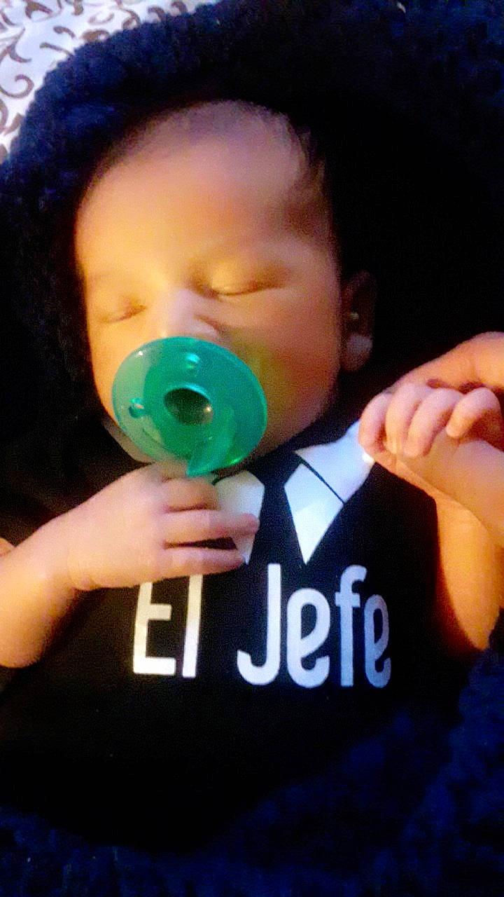 Zaid is registered to the contest to win money with this photo: baby, child, cool, ear, green, hand, nose, person, toddler