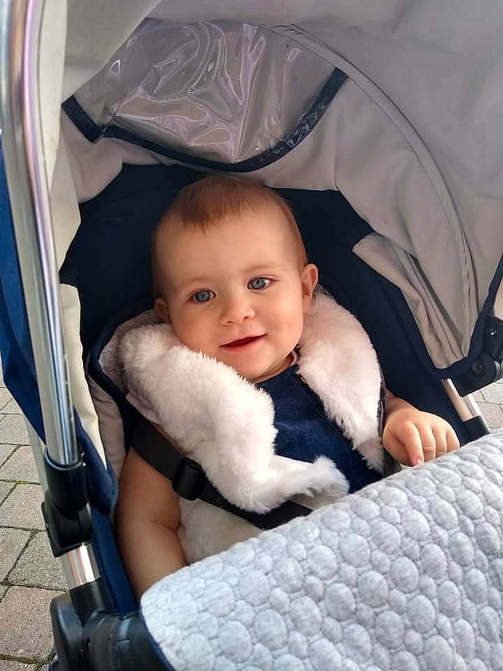 Alexa is registered to the contest to win money with this photo: auto_part, baby, baby_carriage, baby_products, baby_safety, baby_toddler_clothing, beauty, car_seat, child, comfort, electric_blue, flash_photography, happy, infant_bed, joy, linens, person, product, room, sitting