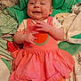 Lilyuana is registered to the contest to win money with this photo: baby, smiling, pink_dress, orange_leggings, polka_dot, infant, bedspread, blanket, clothing, cute, happy, lying_down, child, portrait, indoor, hand_gesture, face, person, expression, toddler