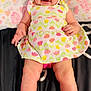Loaiza joined the competition — help win amazing prizes! baby, child, smiling, hat, floral_dress, infant, cute, face, happy, pillow, patterned_clothing, lying_down, skin, legs, hand, indoors, portrait, colorful, bright, cheerful