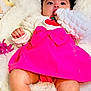 Loaiza joined the competition — help win amazing prizes! baby, child, pink_dress, bow, sunglasses, flower_glasses, blanket, white_blanket, hand, curious, lying_down, cute, infant, face, portrait, close_up, soft_texture, comfortable, indoors, colorful