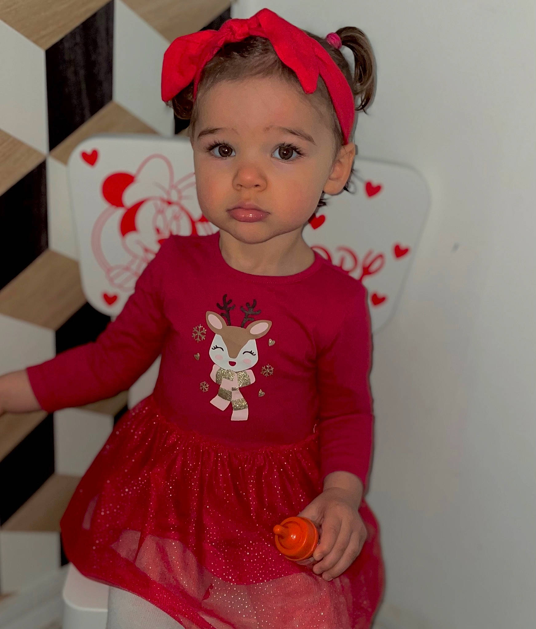 Maddy participe au concours pour gagner de l'argent avec cette photo : baby_toddler_clothing, child, day_dress, dress, embellishment, face, fashion_accessory, happy, headwear, magenta, neck, outerwear, pattern, person, pink, red, shoulder, skin, sleeve, t_shirt