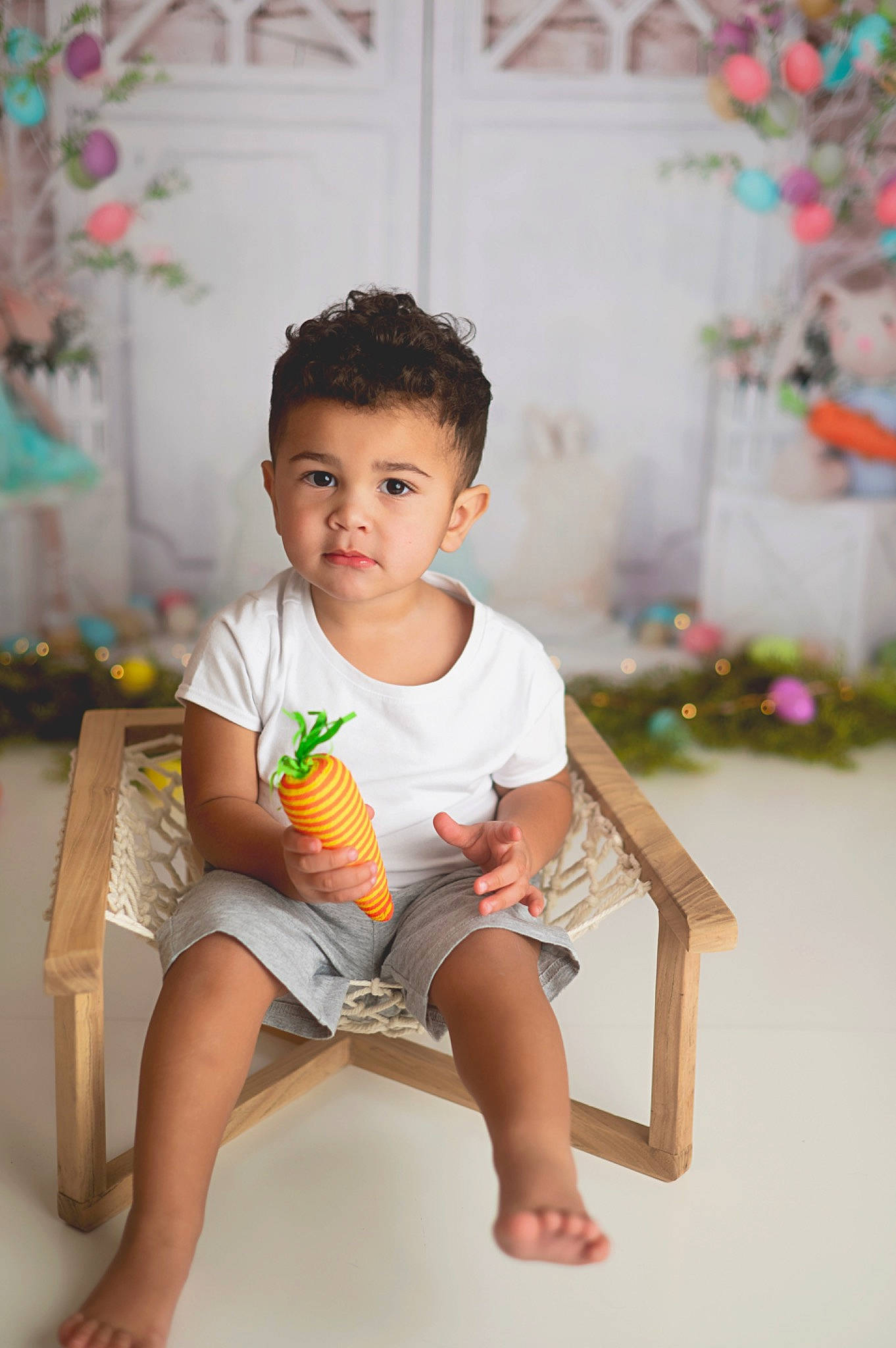 Azaiah joined the competition — help win amazing prizes! baby_toddler_clothing, cheek, child, face, flash_photography, flooring, happy, human_leg, leg, leisure, neck, person, plant, shorts, sitting, skin, sleeve, t_shirt, thigh, toddler