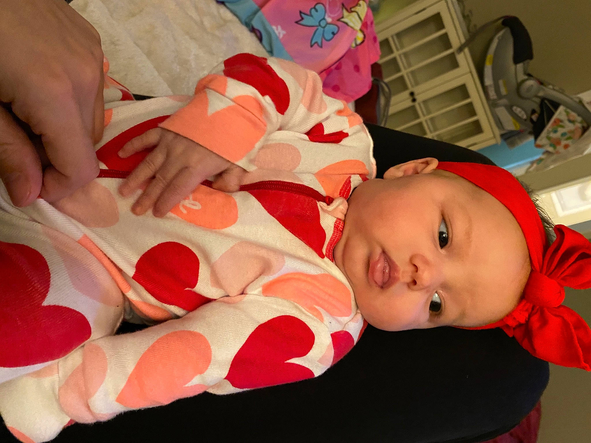 Olivia joined the competition — help win amazing prizes! baby, baby_products, baby_toddler_clothing, carmine, child, comfort, event, foot, fun, hat, human_body, human_leg, lap, nail, orange, person, room, sitting, sleeve, thigh