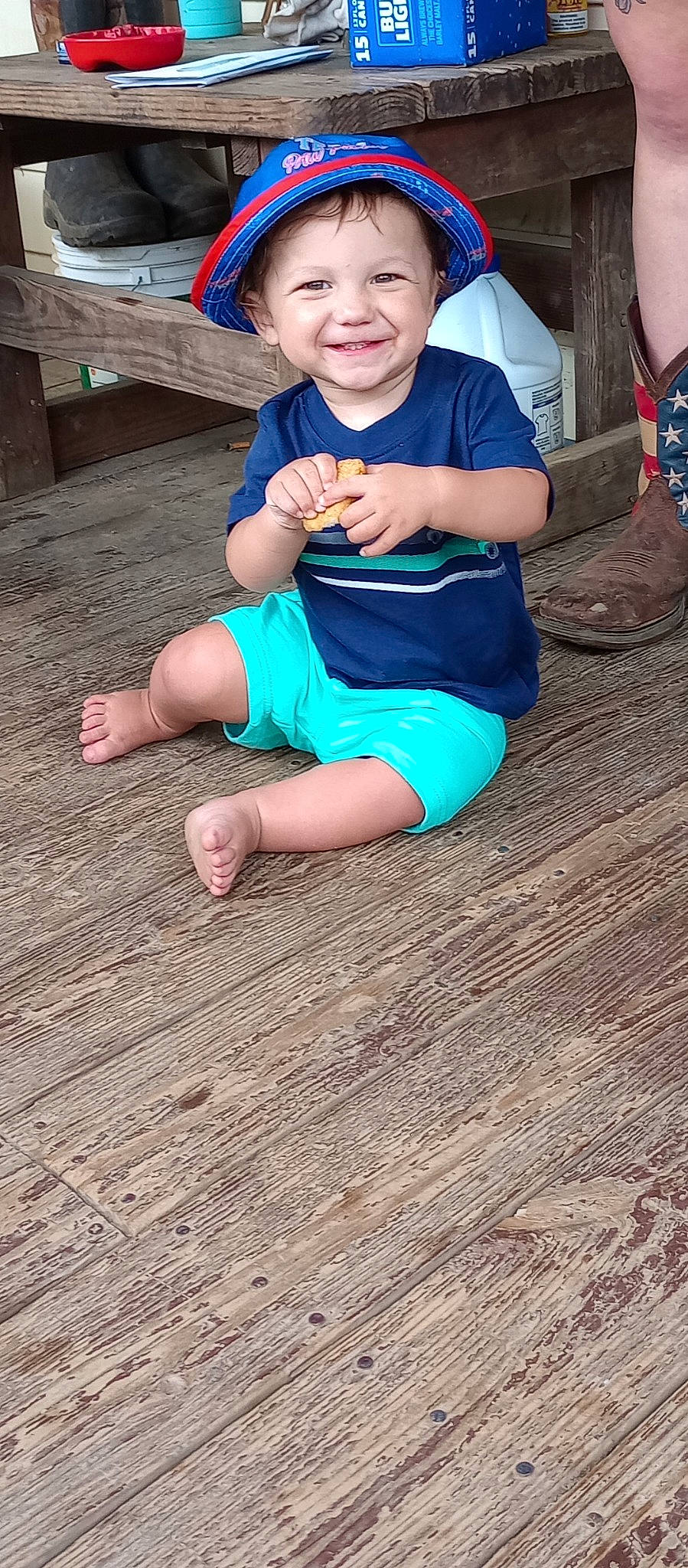 Beau is registered to the contest to win money with this photo: azure, baby_toddler_clothing, blue, eye, flooring, fun, grass, hand, happy, hat, human_body, joy, leg, leisure, person, shoe, skin, smile, summer, thigh