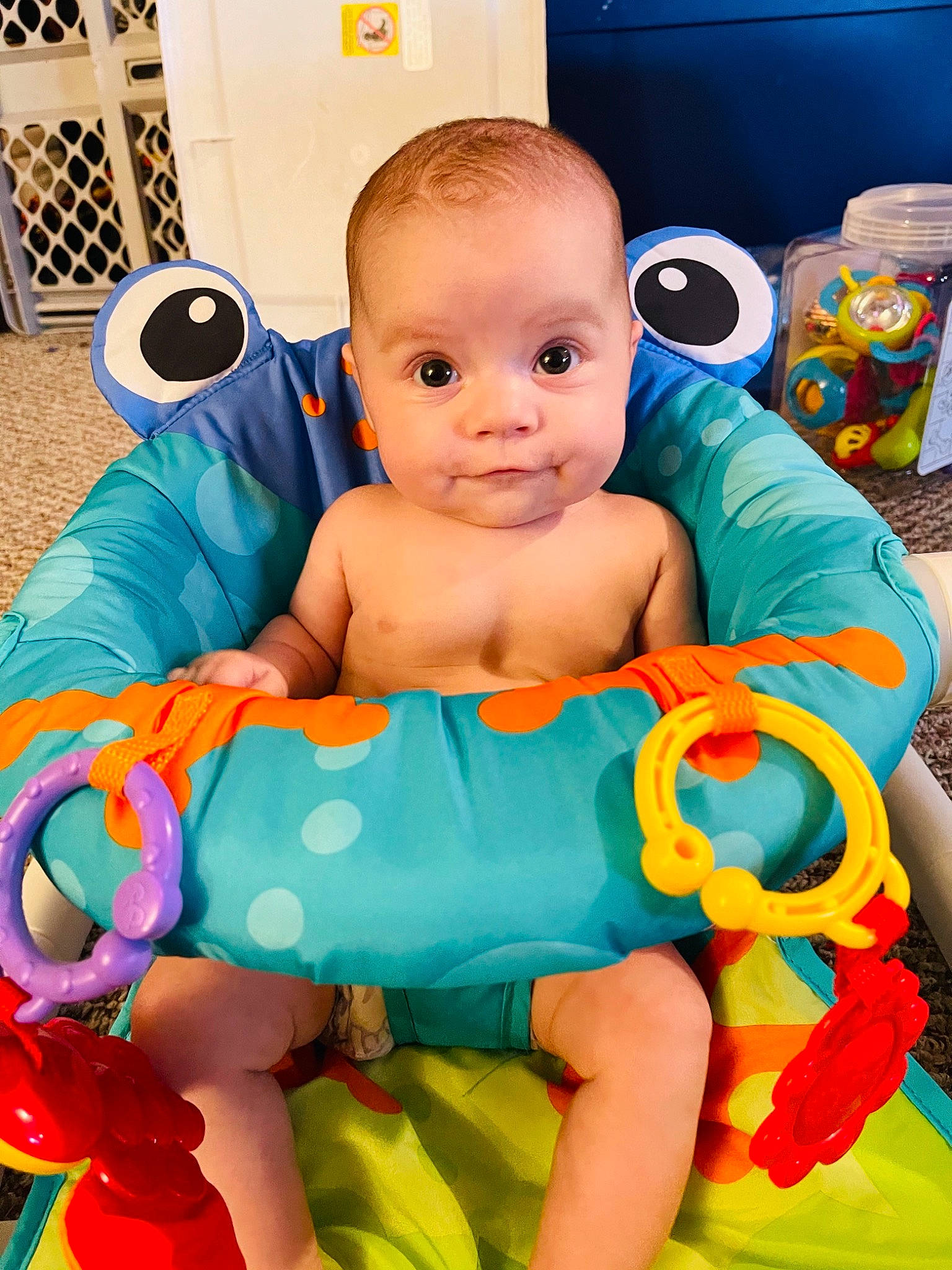 Daliuh is registered to the contest to win money with this photo: abdomen, azure, baby, baby_products, baby_toddler_clothing, baby_toys, child, comfort, fun, happy, iris, pattern, person, play, product, sitting, skin, smile, sock, thigh
