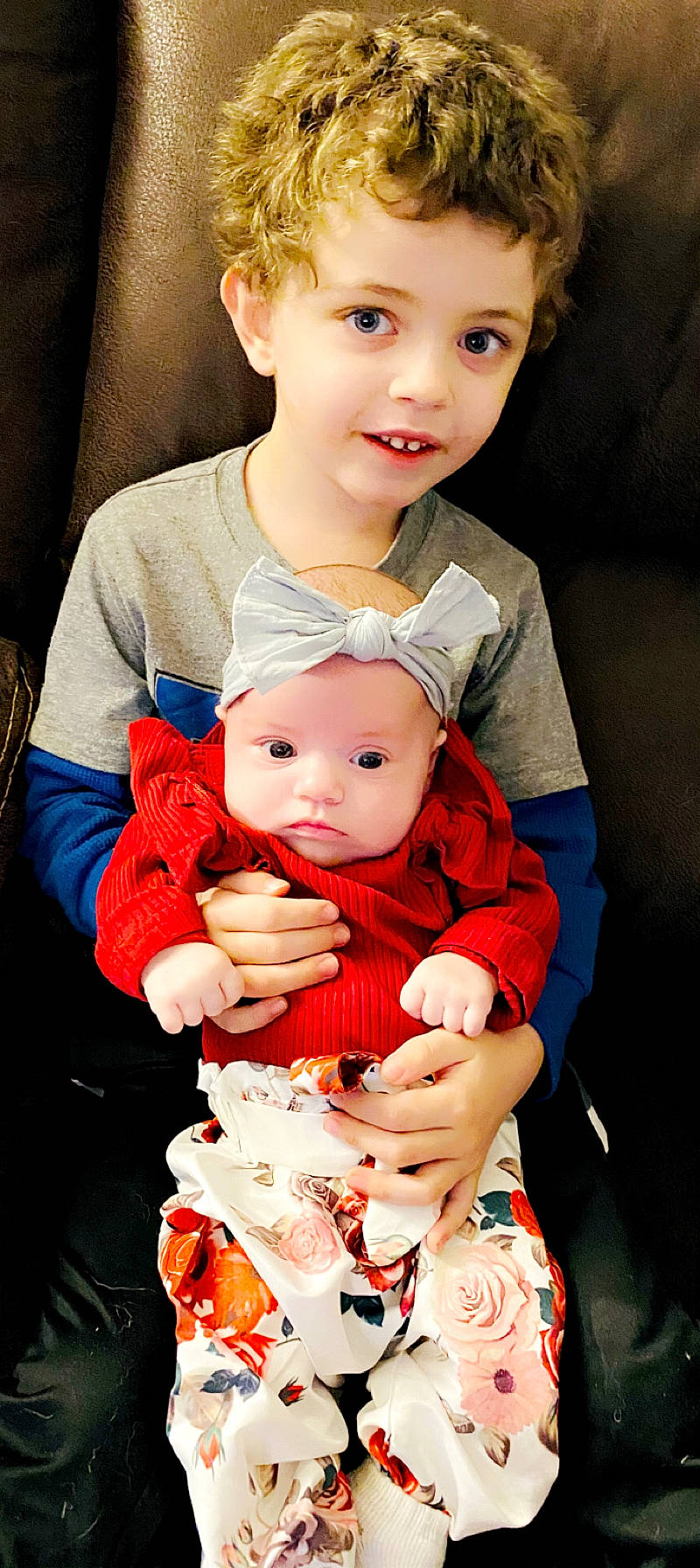 Douglas is registered to the contest to win money with this photo: baby, baby_toddler_clothing, cheek, child, chin, face, finger, hand, happy, human, human_body, iris, lip, organ, people, person, photograph, skin, sleeve, toddler