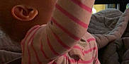 Aurora is registered to the contest to win money with this photo: arm, baby, baby_toddler_clothing, cheek, child, comfort, elbow, finger, fun, gesture, hand, happy, human_body, human_leg, mouth, muscle, nail, skin, thumb, toddler
