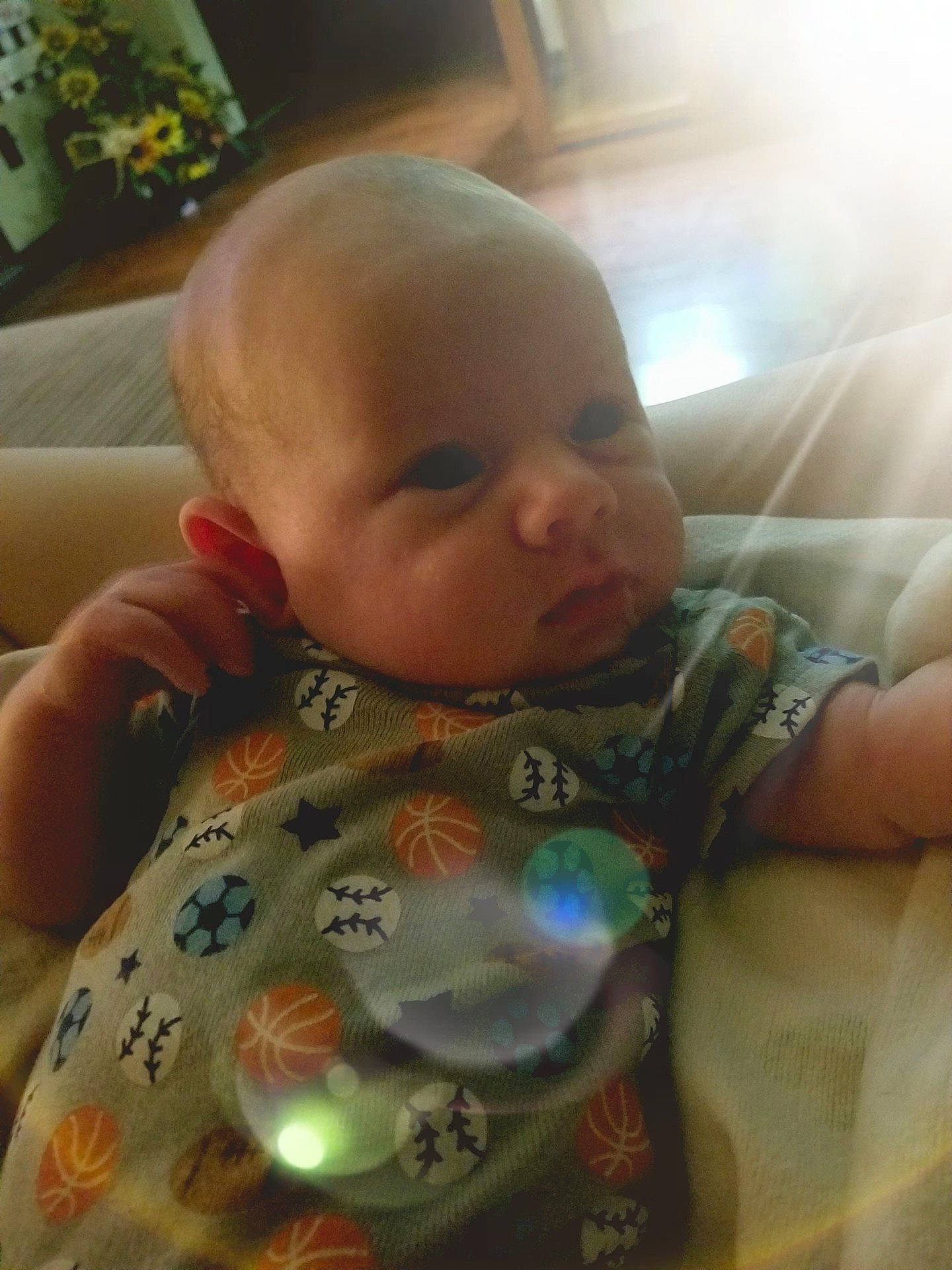 Garrett is registered to the contest to win money with this photo: arm, bedtime, cheek, child, eye, face, finger, forehead, head, infant, iris, lip, mouth, nose, person, product, skin, smile, toddler