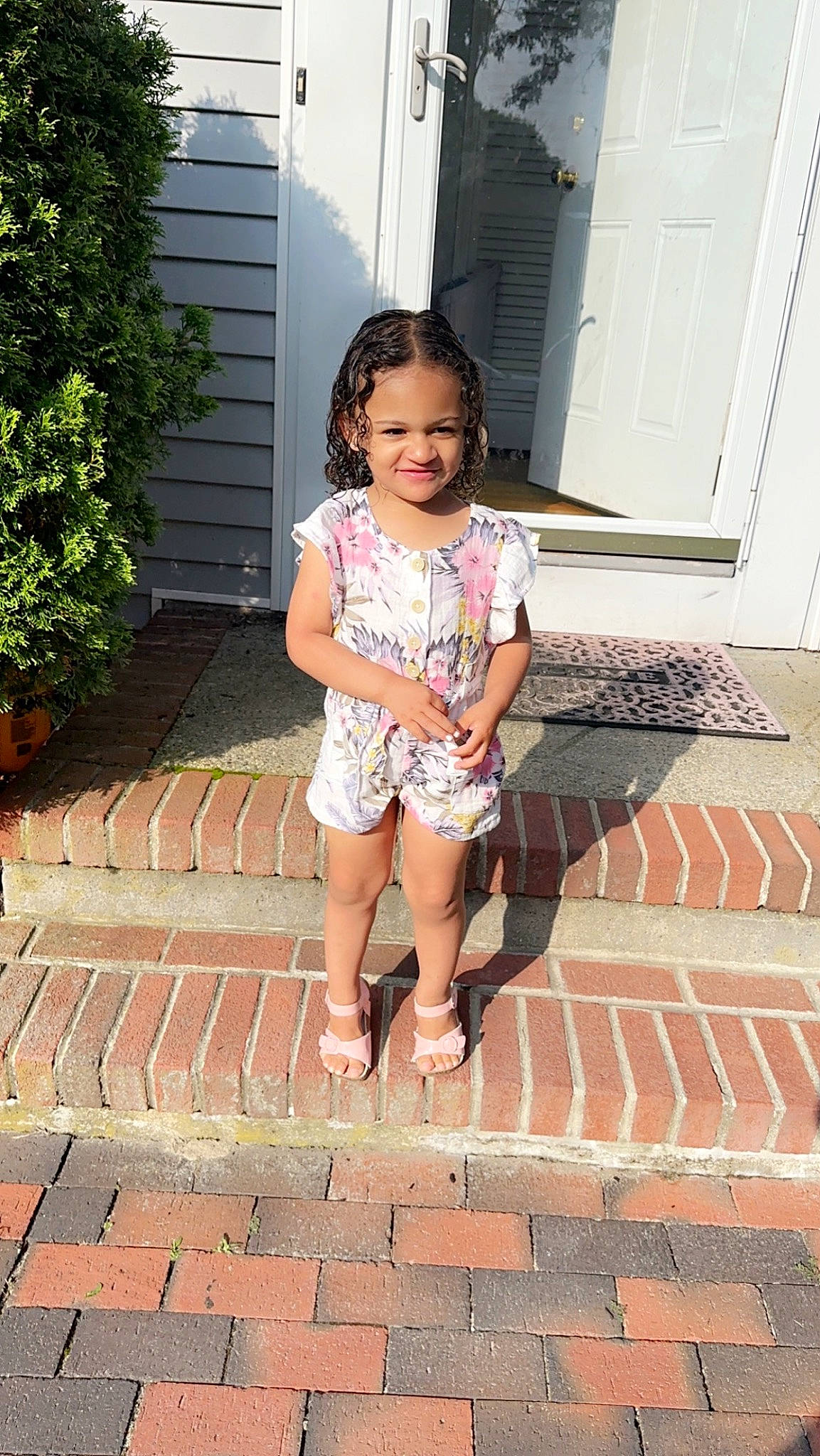 Ashantaya is registered to the contest to win money with this photo: brick, brickwork, door, flagstone, floor, flooring, foot, human_leg, joint, joy, leisure, pattern, person, plant, road_surface, sidewalk, snapshot, thigh, toddler, waist