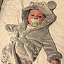 Albie joined the competition — help win amazing prizes! baby, pacifier, robe, hood, ears, mickey_mouse, pajamas, sleepwear, bed, blanket, infant, cute, child, lying_down, soft, cozy, calm, face, hand, indoors