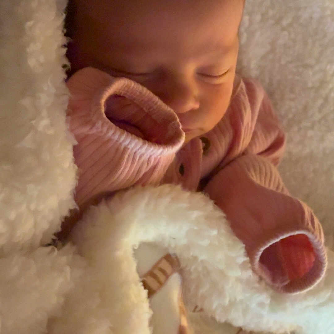 Aurora joined the competition — help win amazing prizes! baby, newborn, sleeping, blanket, pink_clothing, cozy, soft, infant, cute, peaceful, face, child, warm, rest, portrait, closeup, toddler, snuggle, bedtime, comfort