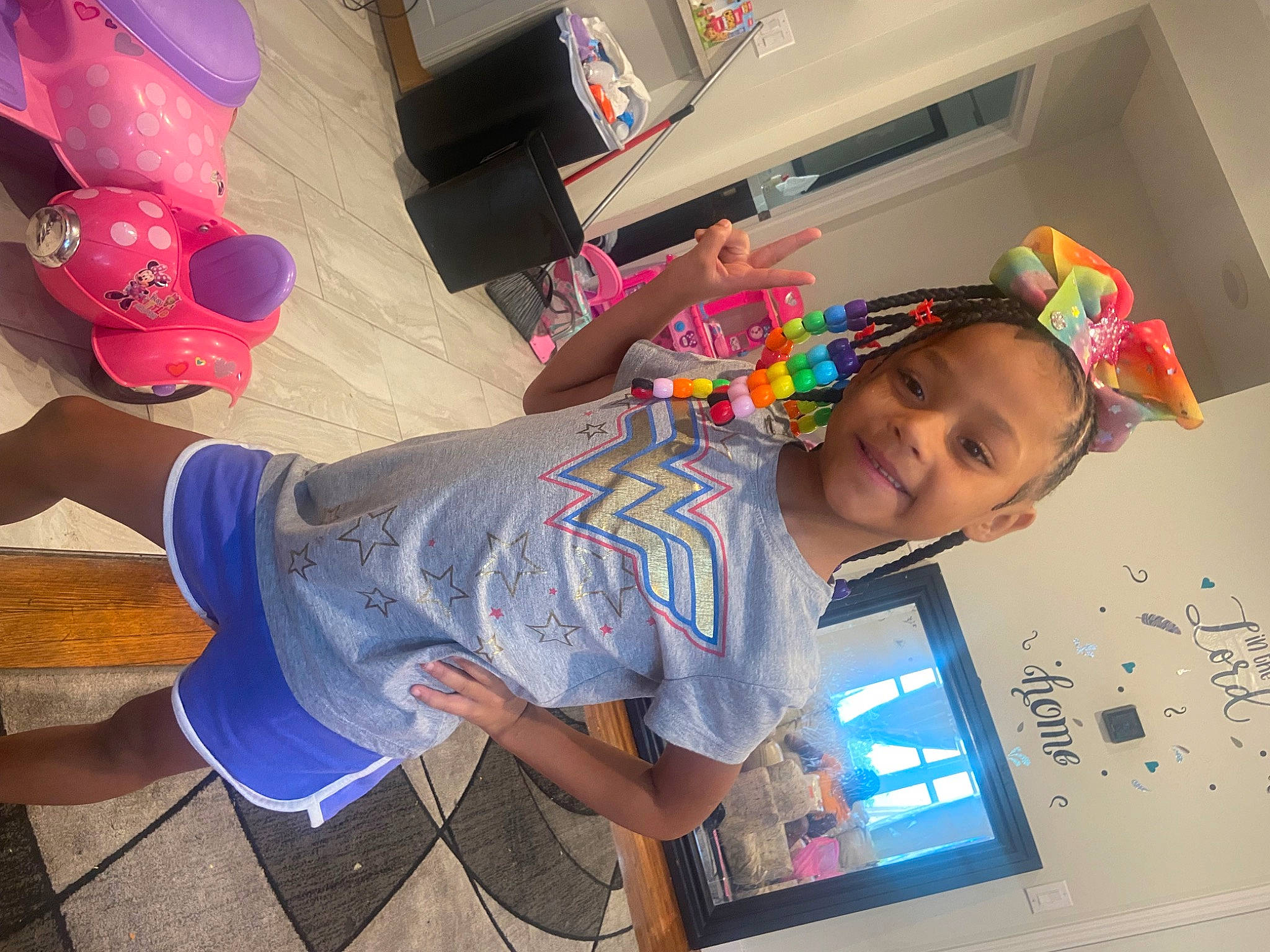 Jazelle is registered to the contest to win money with this photo: child, fun, happy, human_leg, joy, leisure, party, party_supply, person, play, room, sandal, smile, t_shirt, thigh, toddler, toy, vacation