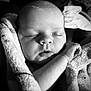 baby, black_and_white, blanket, child, close_up, cute, face, hand, infant, newborn, peaceful, portrait, rest, serene, skin, sleeping, soft_texture, tender, wrapped, young