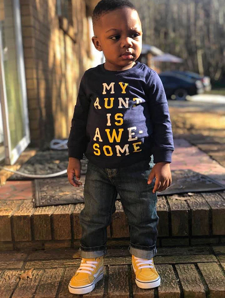 Kaceon is registered to the contest to win money with this photo: child, child_model, clothing, cool, denim, footwear, jacket, jeans, male, outerwear, person, shoe, sleeve, smile, sportswear, standing, street_fashion, t_shirt, toddler, trousers