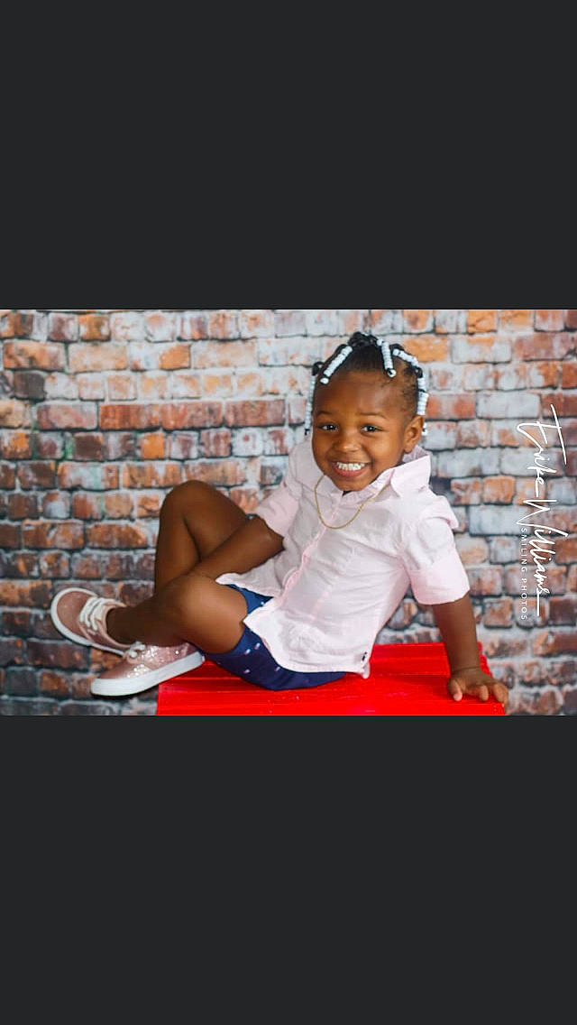 Riah is registered to the contest to win money with this photo: child, child_model, happy, joy, person, photo_shoot, photography, shoe, sitting, stock_photography, toddler