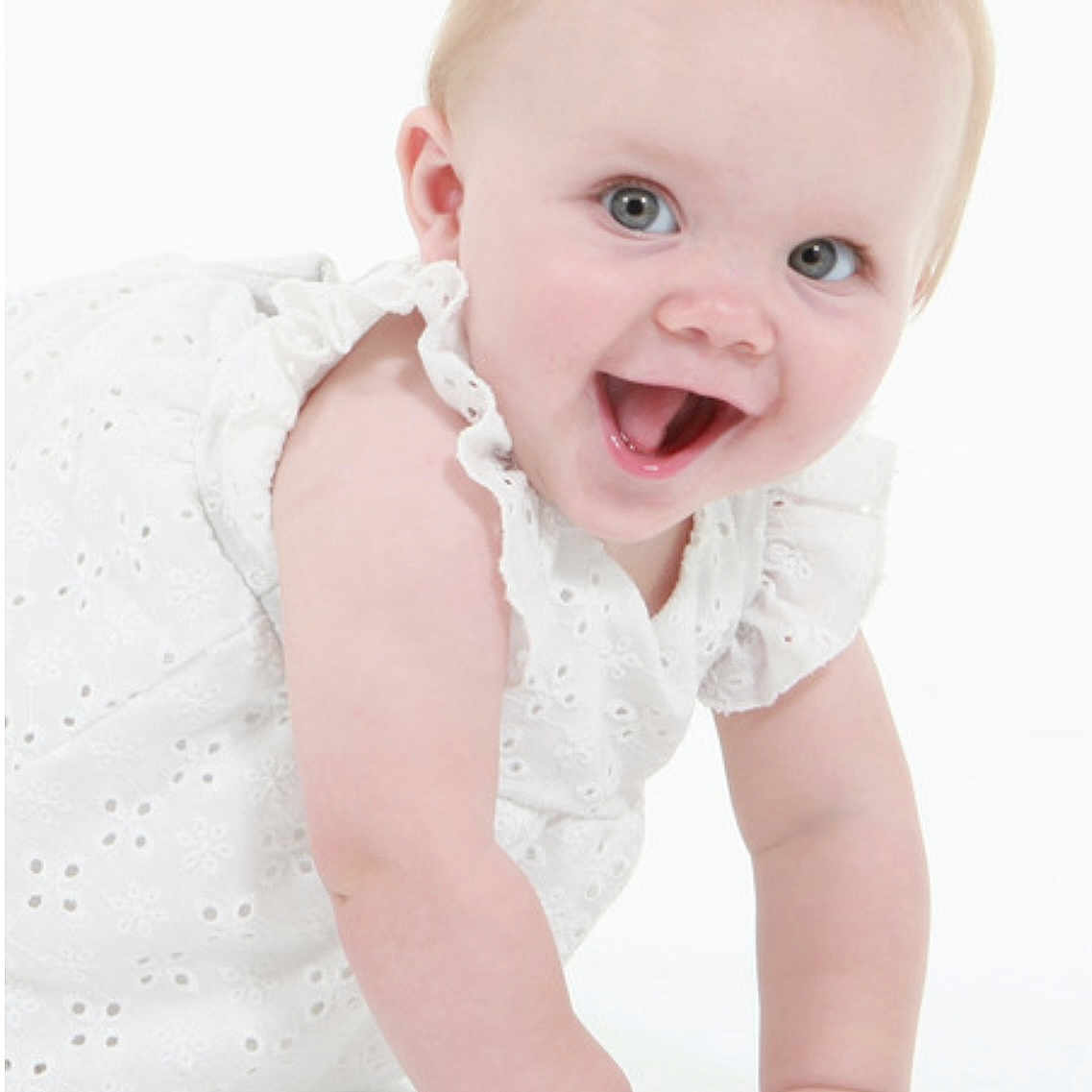 Lilija joined the competition — help win amazing prizes! baby, baby_girl, child, childhood, closeup, crawling, cute, expression, eyes, face, hands, happy, infant, joy, portrait, skin, smiling, studio, white_dress, young