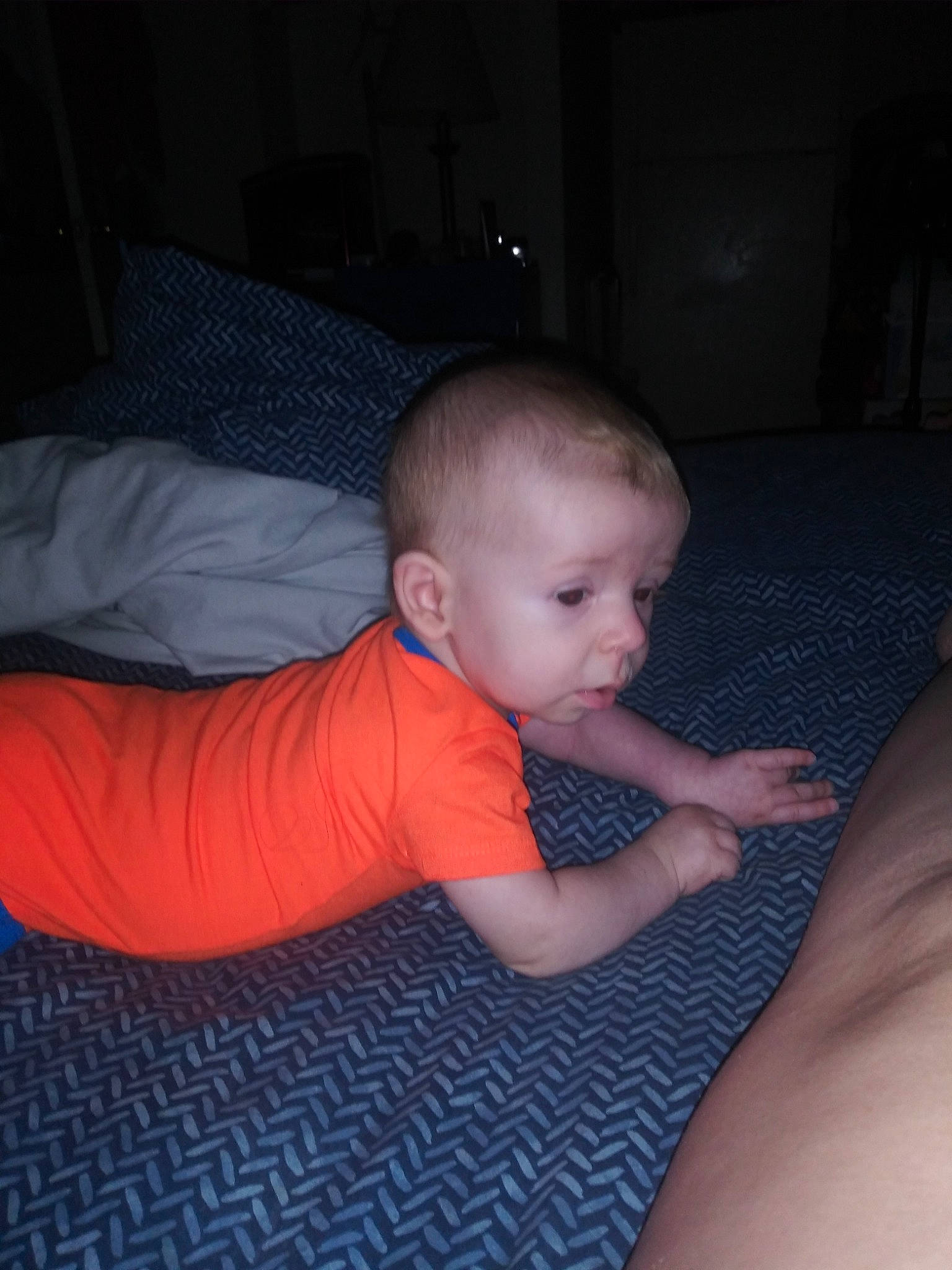 Benny is registered to the contest to win money with this photo: arm, baby, cheek, child, ear, eye, hand, mouth, person, skin, toddler, tummy_time