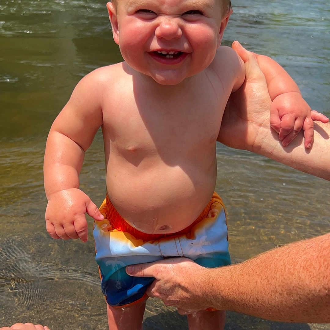 Copelin joined the competition — help win amazing prizes! baby, barefoot, bodypart, clothing, face, finger, hand, happy, head, outdoors, person, photography, portrait, shorts, skin, summer, swimwear, tattoo, water, waterfront