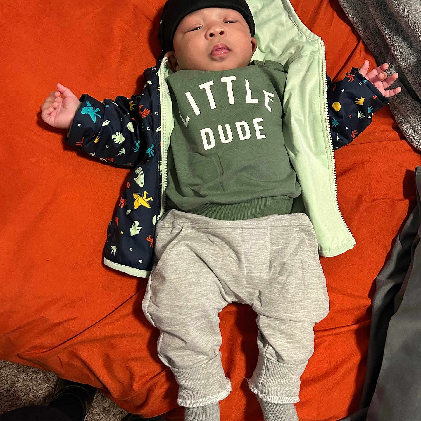 Cayden is registered to the contest to win money with this photo: baby, bed, bedroom, cap, clothing, couch, cushion, face, furniture, hat, head, homedecor, hosiery, pants, person, photography, portrait, sleeping, sock, t_shirt