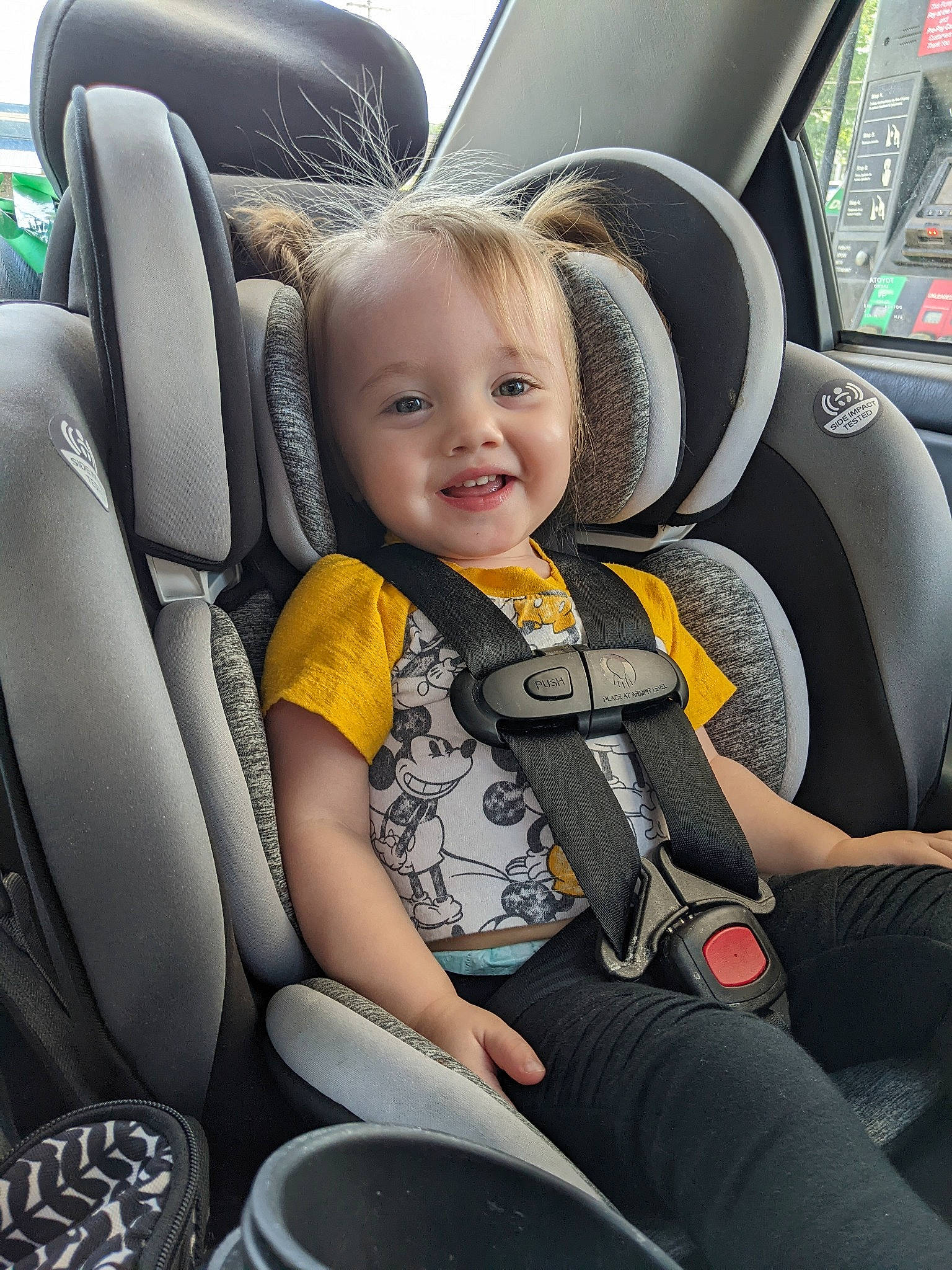 Alora joined the competition — help win amazing prizes! auto_part, automotive_design, automotive_exterior, car, car_seat, car_seat_cover, comfort, head_restraint, motor_vehicle, person, personal_luxury_car, plant, seat_belt, smile, steering_part, steering_wheel, toddler, vehicle, vehicle_door, white