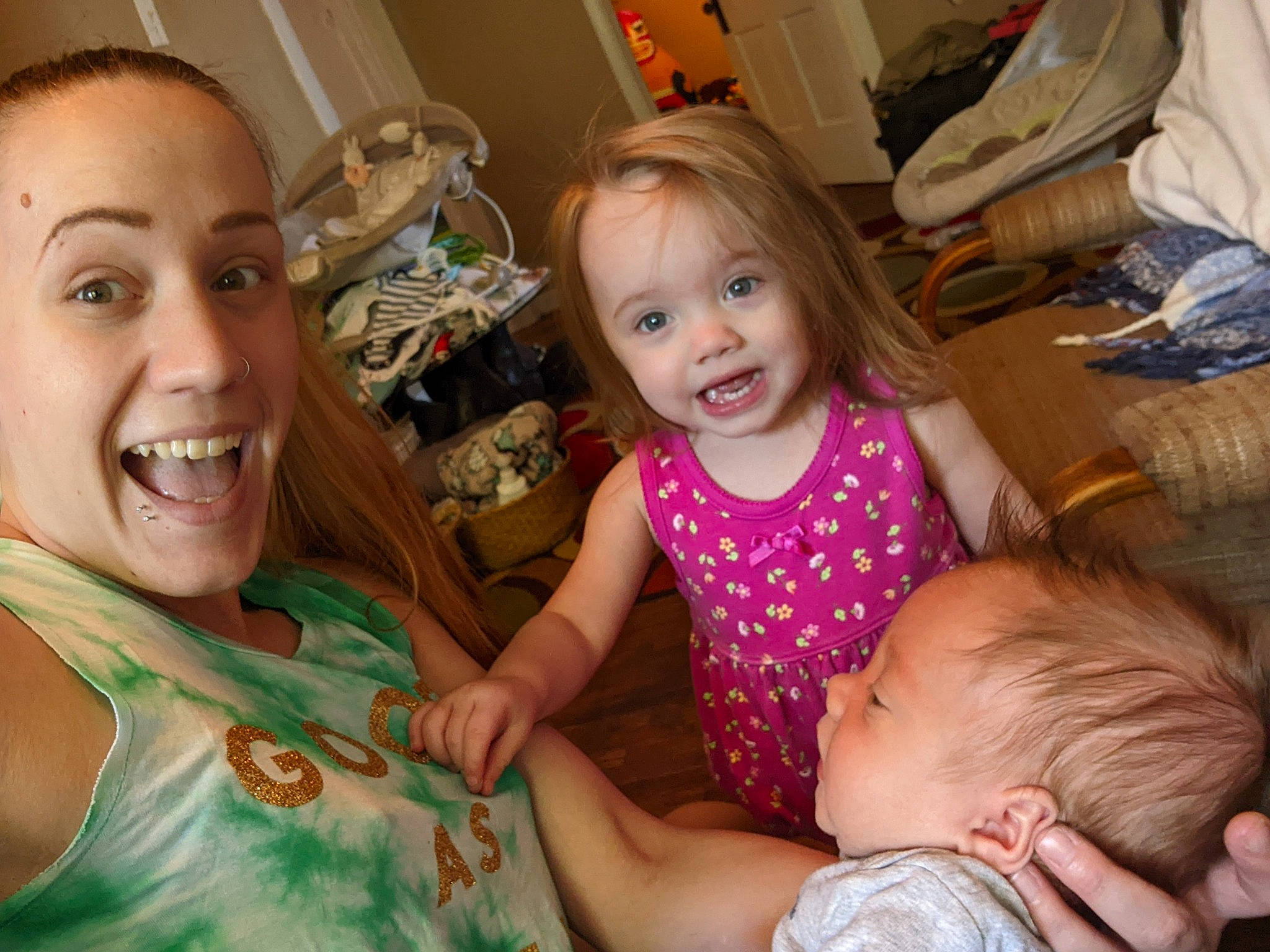 Alora is registered to the contest to win money with this photo: chair, cheek, child, eye, face, facial_expression, finger, fun, hand, happy, head, human_body, iris, joy, lap, mouth, organ, person, skin, smile